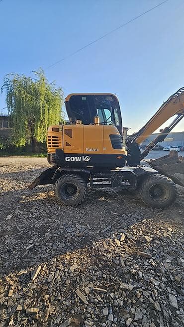 yan up: Экскаватор, Hyundai, Колесный — 2