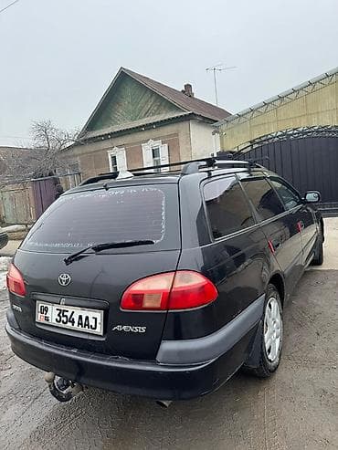 7 мест 3 ряда сидений: Toyota Avensis: 2001 г., 1.8 л, Механика, Бензин, Универсал — 3