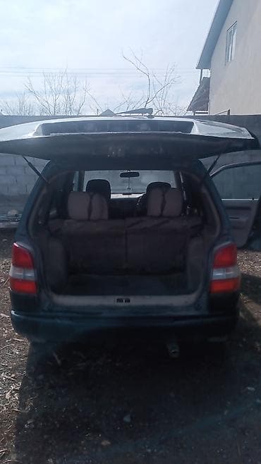 bwb e34: Mazda Demio: 1998 г., 1.5 л, Автомат, Бензин, Хэтчбэк — 8