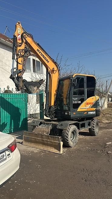 Экскаватор, Hyundai, Колесный