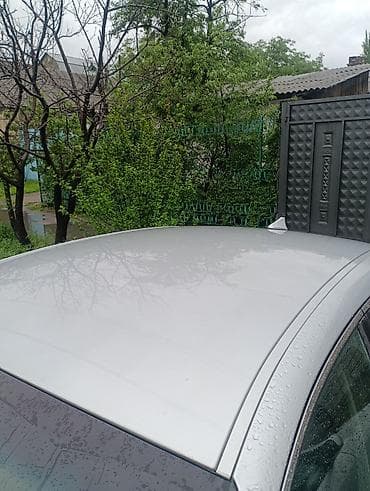 zimmer e9 pro: Седан бизнес‑класса серебристого цвета. Кузов и дизайн: - Элегантный — 3