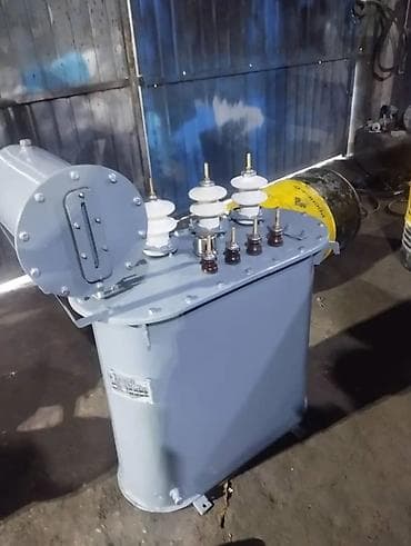 тмг: Силовой трансформатор серого цвета с расширительным баком и — 3
