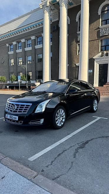 45: Cadillac : 2013 г., Автомат, Бензин, Седан — 2