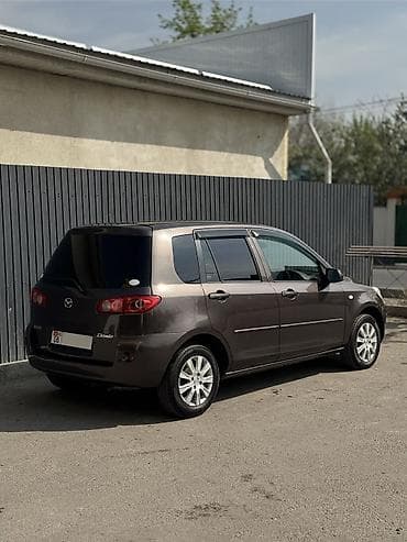 second tech: Mazda Demio: 2006 г., 1.3 л, Автомат, Бензин, Хэтчбэк — 2