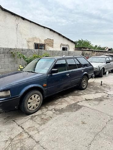 daf 75: Nissan Bluebird: 1988 г., 2 л, Механика, Дизель, Универсал — 1