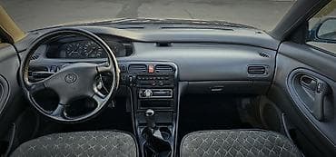 Транспорт: Mazda 626: 1993 г., 2 л, Механика, Бензин, Седан — 5