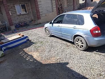 стекло авто: Kia Cerato: 2004 г., Седан — 2