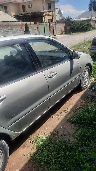 Унаа сатуу: Mitsubishi Lancer: 2001 г., 1.6 л, Кол менен иштөөчү, Седан — 9