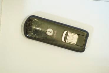 Аудиотехника: USB-модем Megafon 4G в черном корпусе. Предназначен для обеспечения — 1