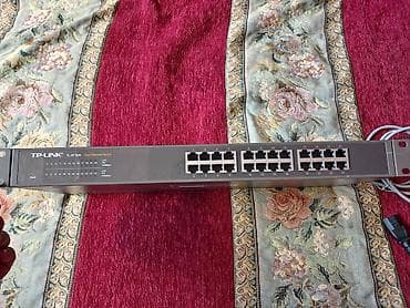 Коммутатор TP-Link TL-SF1024, 19-дюймовый стоечный, 24 порта 10/100M