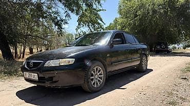 Транспорт: Mazda 626: 2001 г., 2 л, Механика, Бензин, Седан — 3