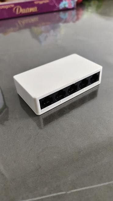 modem 4g: 5‑портовый switch - 5 портов RJ‑45 с автоопределением скорости — 1