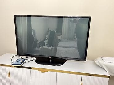 Телевизор LG, диагональ примерно 65 дюймов (экрана формата 16:9)