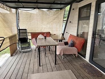 финский дом: Каркасный дом A-Frame с большой крытой террасой — 2