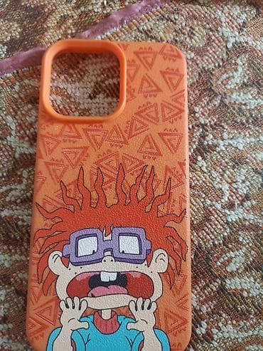 Яркий чехол для Айфона 14 про Макс с мультяшным принтом на оранжевом at lalafo.kg Яркий чехол для Айфона 14 про Макс с мультяшным принтом на оранжевом