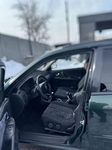 mazda 323 2003: Mazda 323: 2000 г., 1.6 л, Механика, Бензин, Универсал — 2