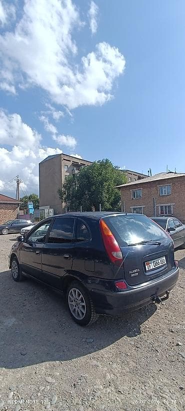чанган уни к: Nissan Almera Tino: 2004 г., 1.8 л, Кол менен иштөөчү, Бензин, Хетчбек — 2