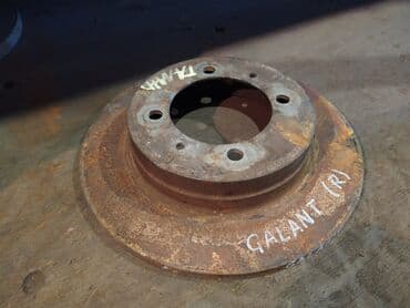 перфорированные тормозные диски: Mitsubishi Galant Тормозной диск, Митцубиси Галант диск тормозной — 1