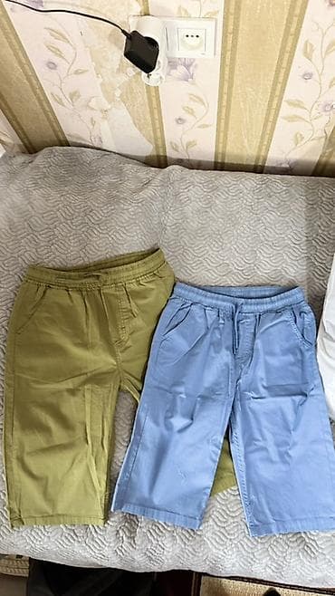 Джинсы и брюки, цвет - Голубой