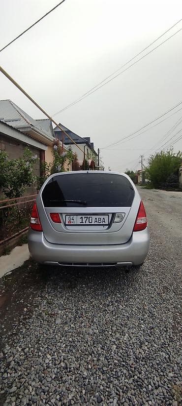 крылья субару: Компактный хэтчбек/седан B‑класса, салон серо‑чёрный, 5 мест — 6