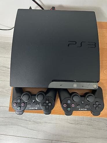 Sony PlayStation 3 (Slim) + 2 беспроводных геймпада DualShock 3. 65