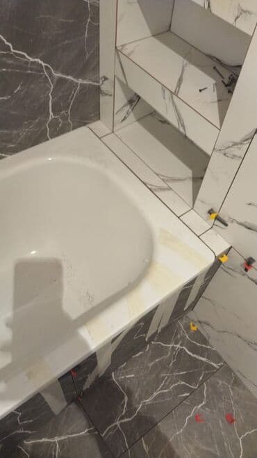 Услуги по строительству и ремонту: Укладка плитки в ванной | Керамогранитая плитка | Вертикальная укладка Больше 6 лет опыта — 9