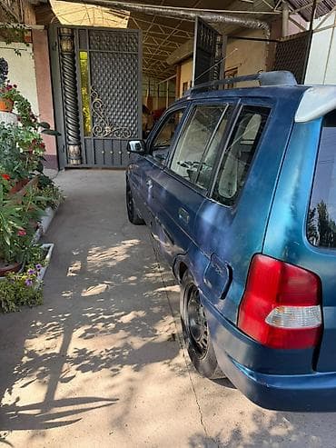 машина капейка: Mazda Demio: 1999 г., 1.5 л, Механика, Бензин — 5