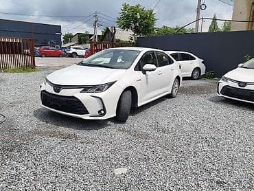 Toyota Corolla: 2019 г., 1.8 л, Автомат, Гибрид, Седан