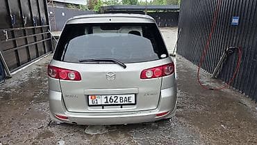 с моей доплатой: Mazda Demio: 2004 г., 1.3 л, Бензин — 4