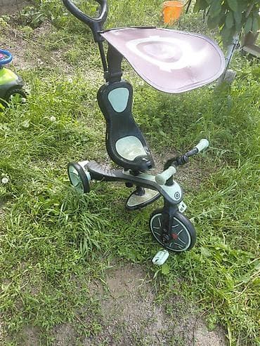 Детский трехколесный велосипед с родительской ручкой и козырьком -