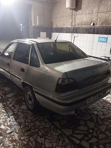 хундай аванте 1: Daewoo Nexia: 2005 г., 1.6 л, Кол менен иштөөчү, Бензин, Седан — 9