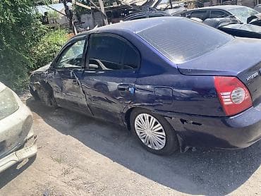 Hyundai Elantra (седан), темно-синий цвет. Автомобиль после ДТП — 5