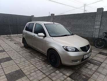 Mazda Demio: 2003 г., 1.3 л, Автомат, Бензин, Хэтчбэк
