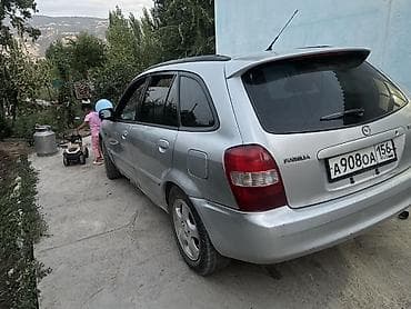 Mazda Familia: 1999 г., 1.5 л, Автомат, Бензин, Универсал at lalafo.kg Mazda Familia: 1999 г., 1.5 л, Автомат, Бензин, Универсал