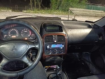eclipse cross: Mitsubishi Carisma: 2001 г., 1.8 л, Механика, Бензин, Седан — 7