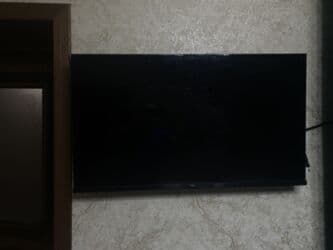 Смарт-часы: Плоский LED-телевизор, настенное крепление. - Диагональ — 2