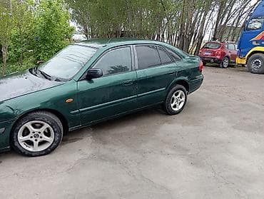 диски на форд фокус 1: Mazda 626: 1997 г., Седан — 2