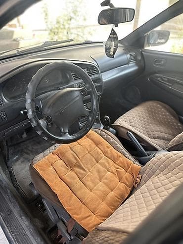 mazda 323 цена: Mazda 323: 1997 г., 1.4 л, Механика, Бензин, Седан — 4