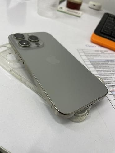 IPhone 15 Pro, Новый, 128 ГБ, Natural Titanium, Чехол, 87 %