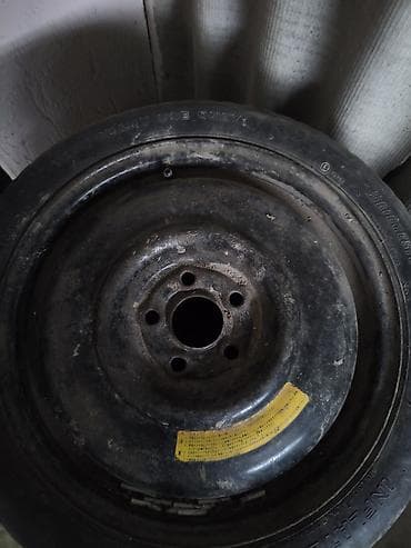 r15 ist: Комплект автомобильных шин + докатка на штампованном диске. - — 2
