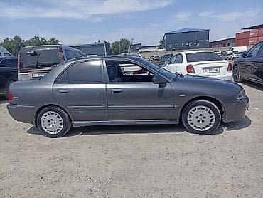 Mitsubishi Carisma: 2003 г., 1.6 л, Автомат, Газ, Седан — 2