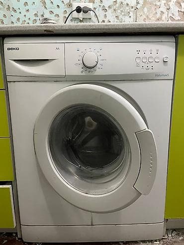 Стиральная машина Beko Volumax5, фронтальная загрузка. - Класс — 1