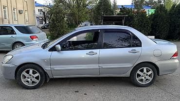 выхлоп бмв е34: Mitsubishi Lancer: 2005 г., Ручные, Бензин, Седан — 2