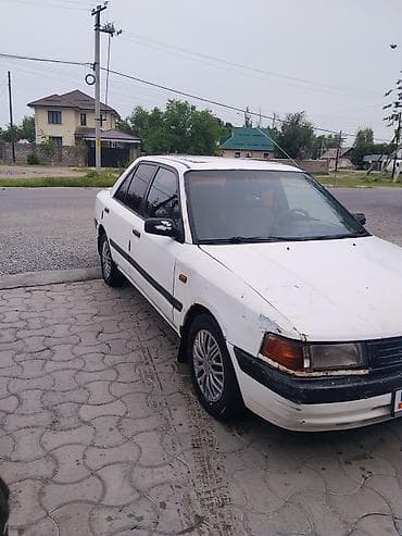 zero x neo: Mazda 323: 1990 г., Механика, Бензин, Седан — 2