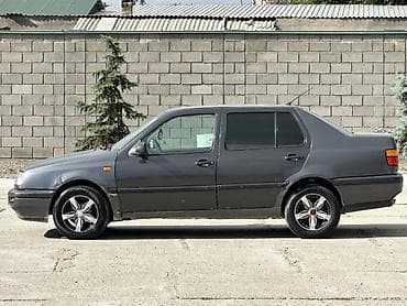 выхлопы машин: Volkswagen Vento: 1996 г., 1.8 л, Механика, Бензин, Седан — 3