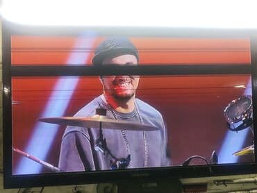 колонки к телевизору: Телевизор Samsung с плоским экраном, диагональ примерно 42 дюймов — 1