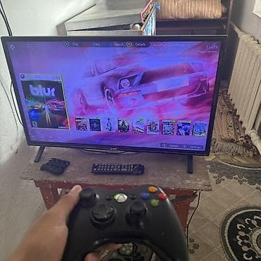 Игровая приставка Xbox 360 с установленным дашбордом и библиотекой игр