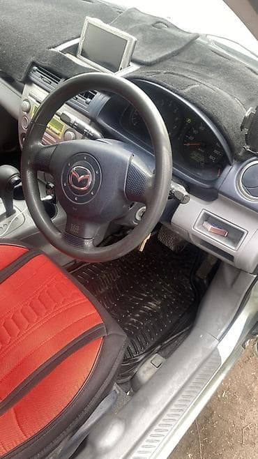 замки на авто: Mazda Demio: 2003 г., 1.5 л, Автомат, Бензин, Хэтчбэк — 5