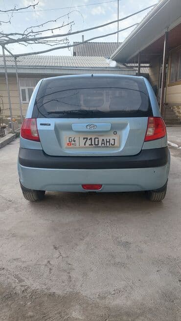 красный авто: Hyundai Getz: 2007 г., 1.4 л, Механика, Бензин, Седан — 5