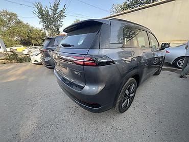 GAC: Aion Hyper HT (GAC Aion) — современный электрический кроссовер в белом — 5